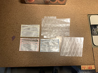 3 finished wallets and one in progress with the 2 panels cut out.