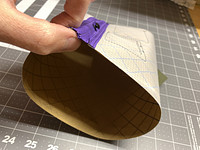 Zipper sliders added to join the two zipper halves and make a tube