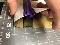 Webbing loops added that will act as zipper pull tabs / strap attachment points
