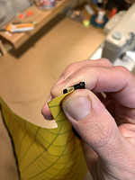 Zipper sewn on, fabric folded over before topstitching.