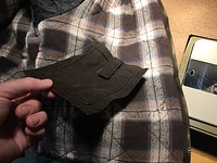 Pocket removed from liner.